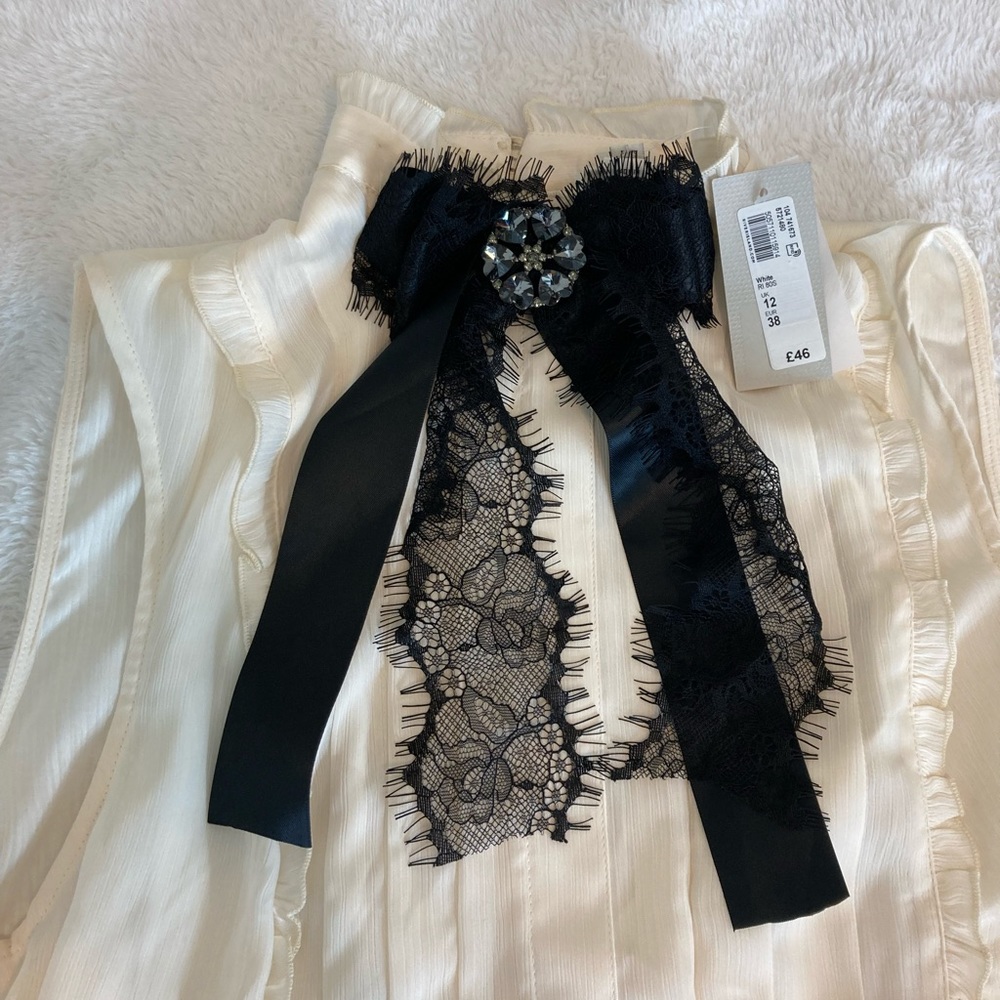 New River Island London Babydoll dress in size 8 US and 12 UK